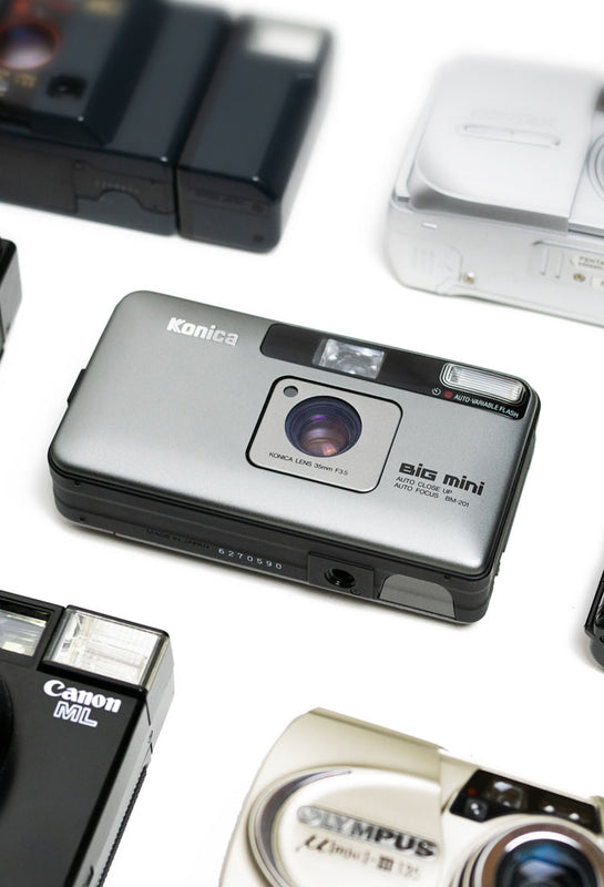 Point and Shoot Cameras from Konica Olympus Canon Nikon