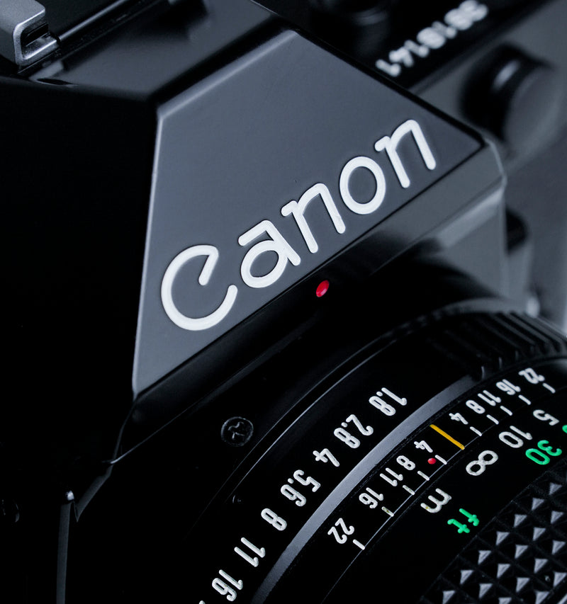 Canon AE-1 Program Black 35mm SLR Film Camera with 50mm F1.8 28-85MM F