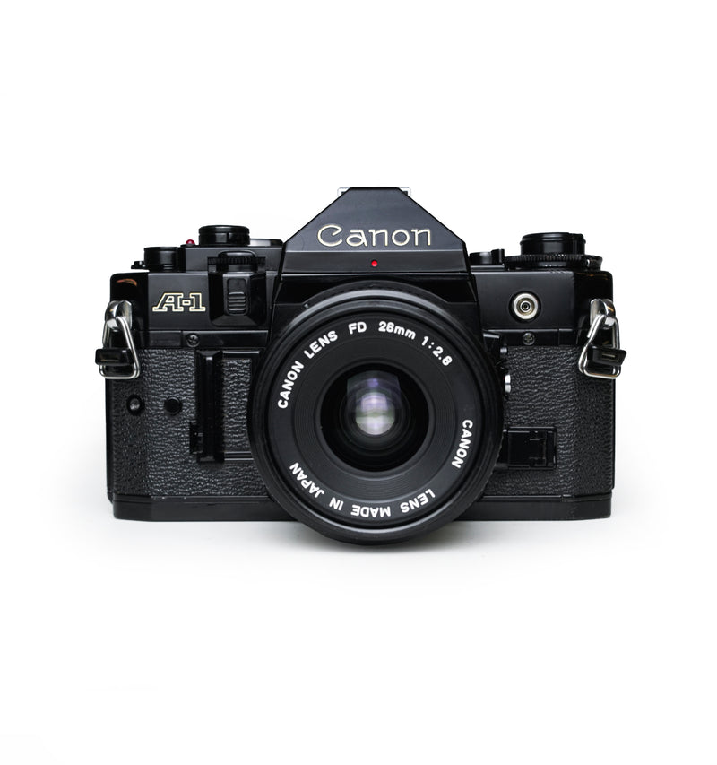 Canon A-1 35mm SLR Film Camera with 28mm Lens –