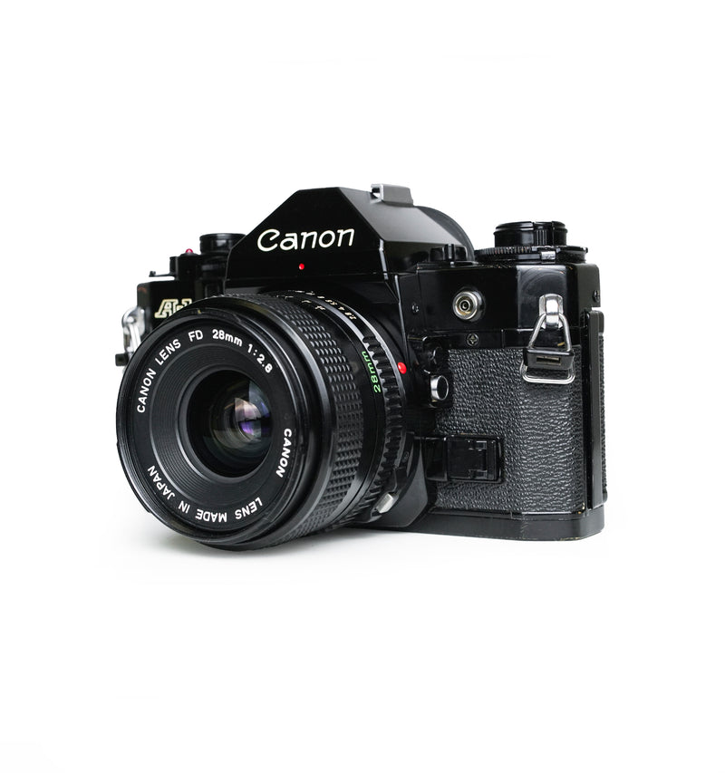 Canon A-1 35mm SLR Film Camera with 28mm Lens