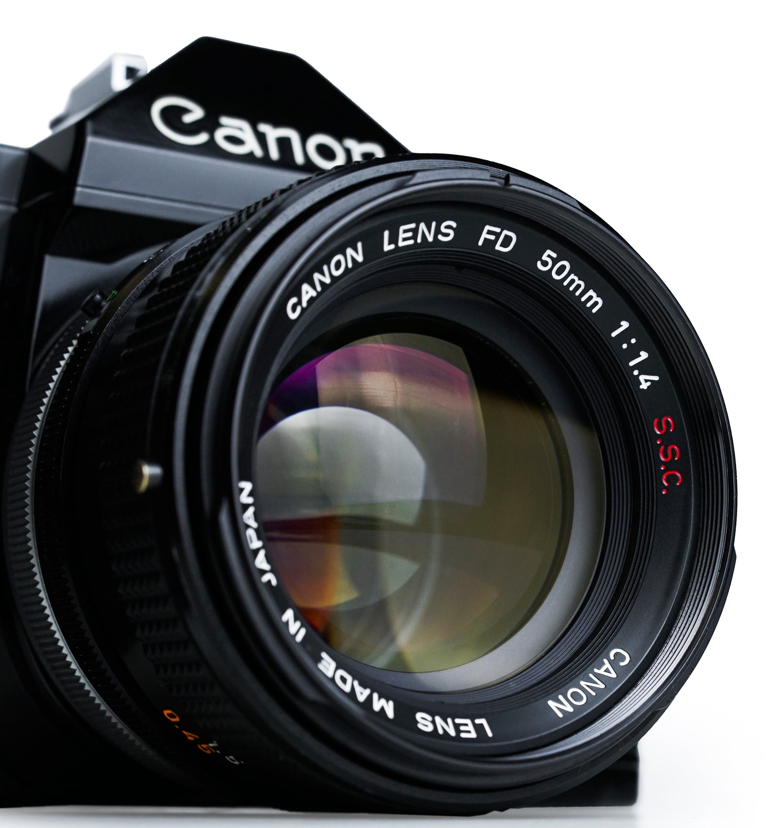 Canon A-1 35mm film camera with 50mm 1.4 SSC version lens and extras