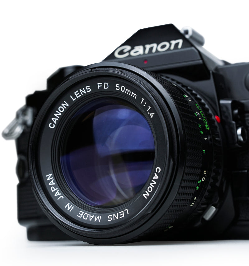 Canon AE-1 Program Black 35mm SLR Film Camera with 50mm f1.4 Lens